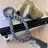 Chinoiserie Necklace with Tassel and Charm