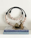 Conus Shell Necklace (on stand)